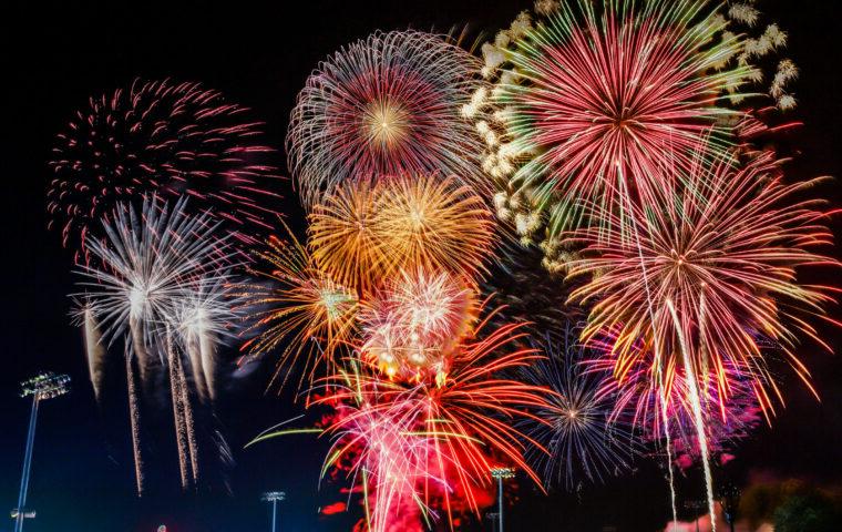fireworks light up the sky over a festival